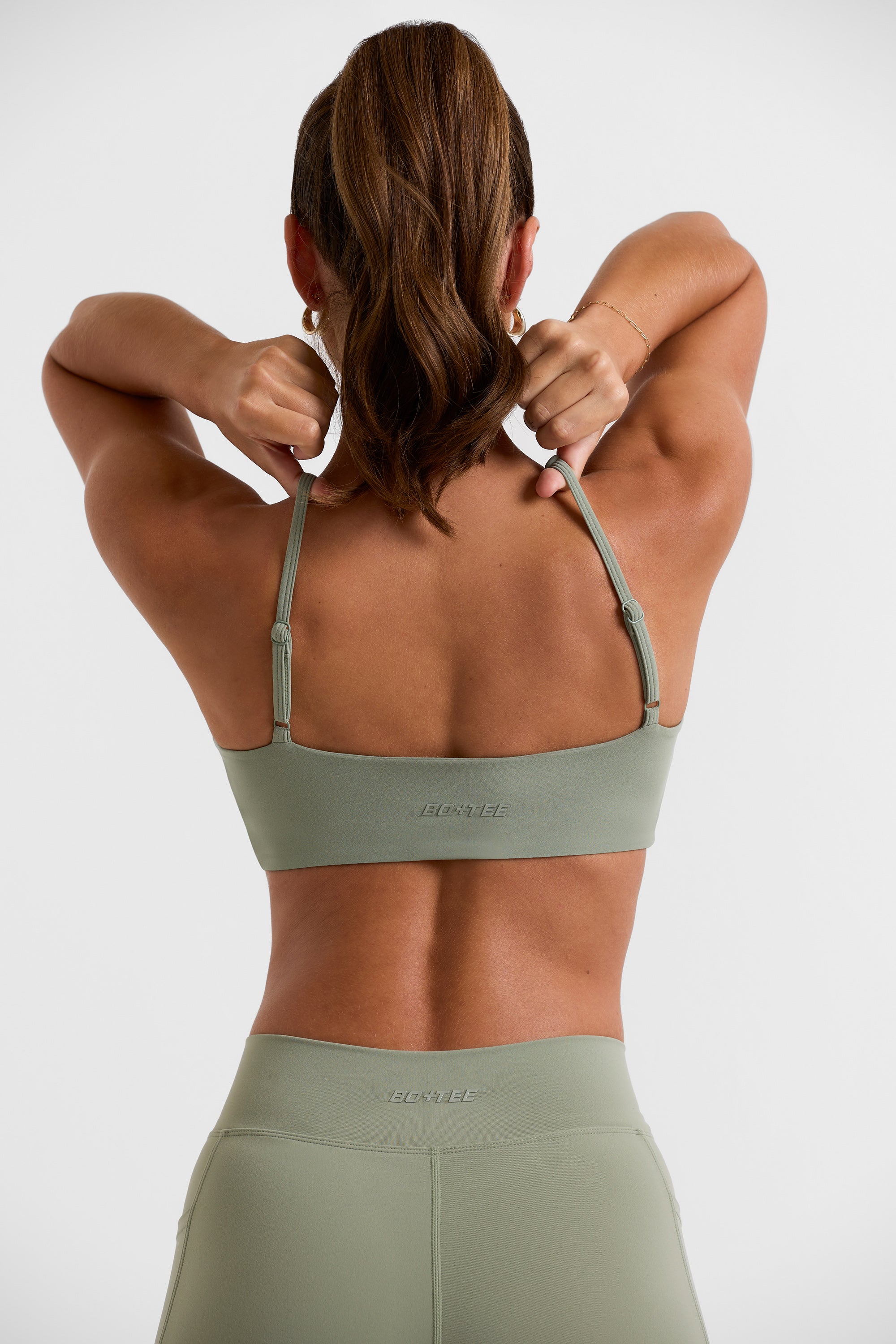 Aira Twisted Performance Bra - Adorn Boutique