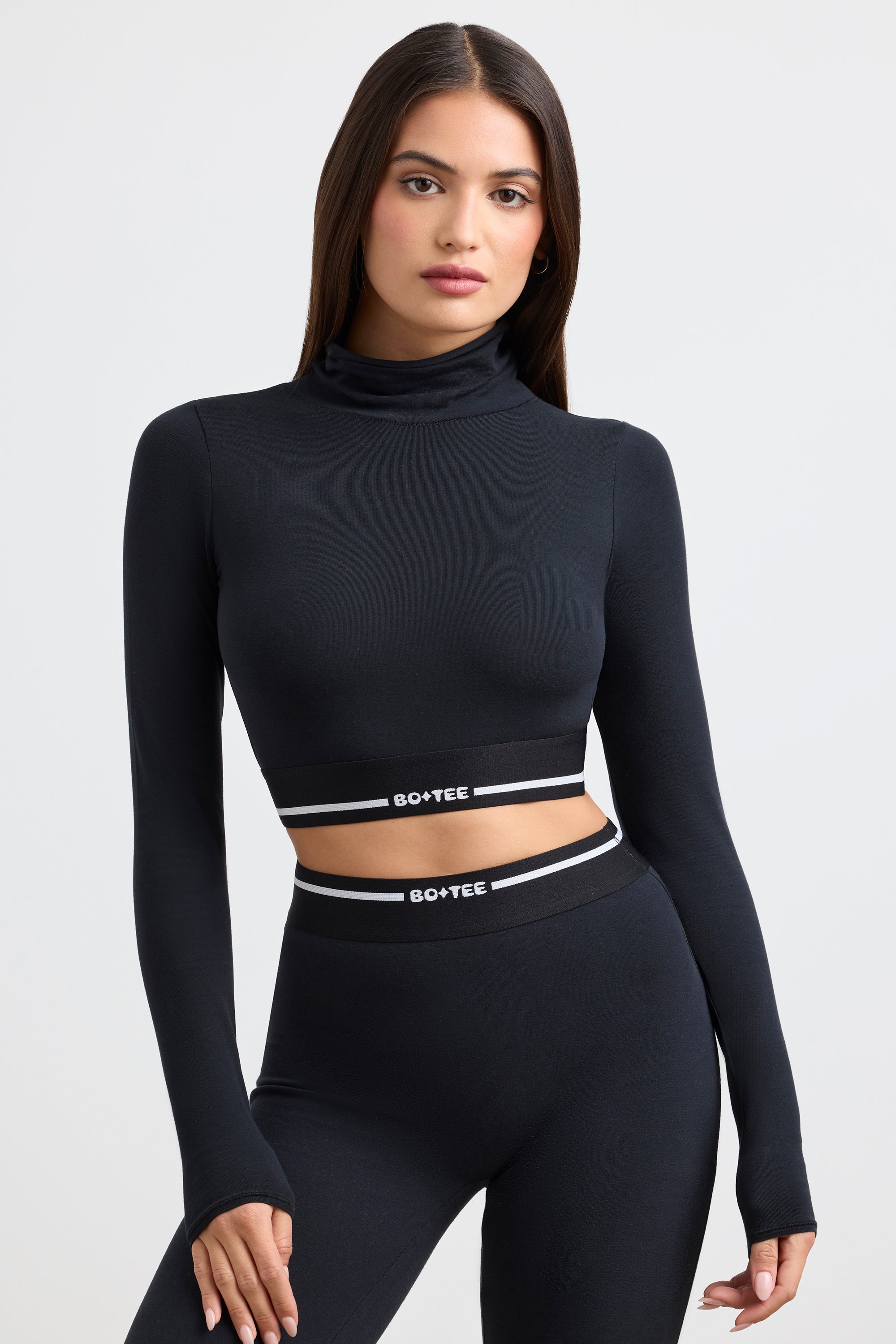 Stretch Cotton Jersey Backless Turtleneck Long-Sleeve Crop Top in Black