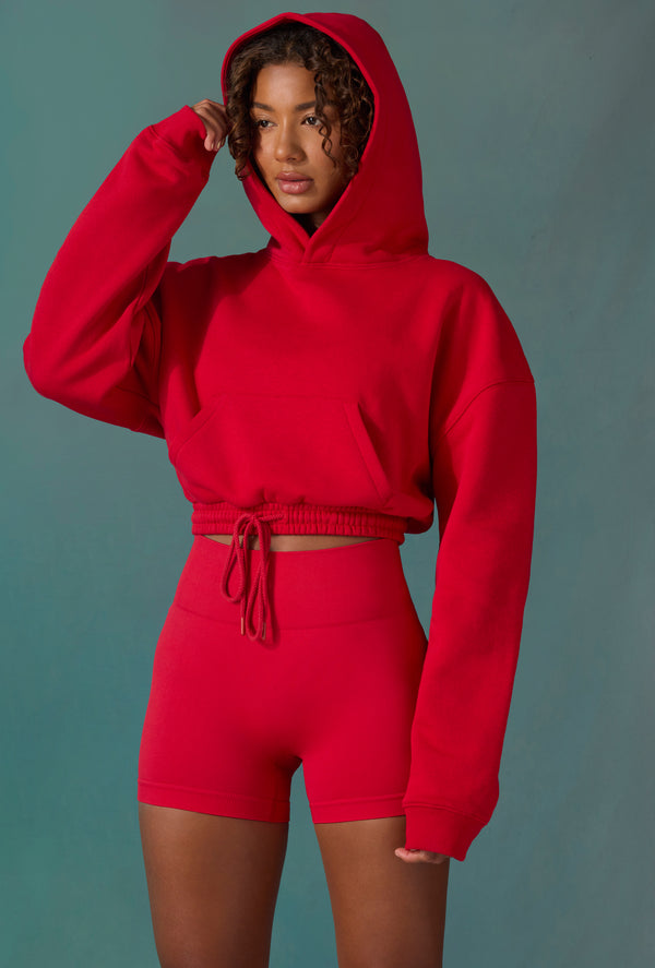 Progress - Cropped Drawstring Hooded Sweatshirt in Tango Red