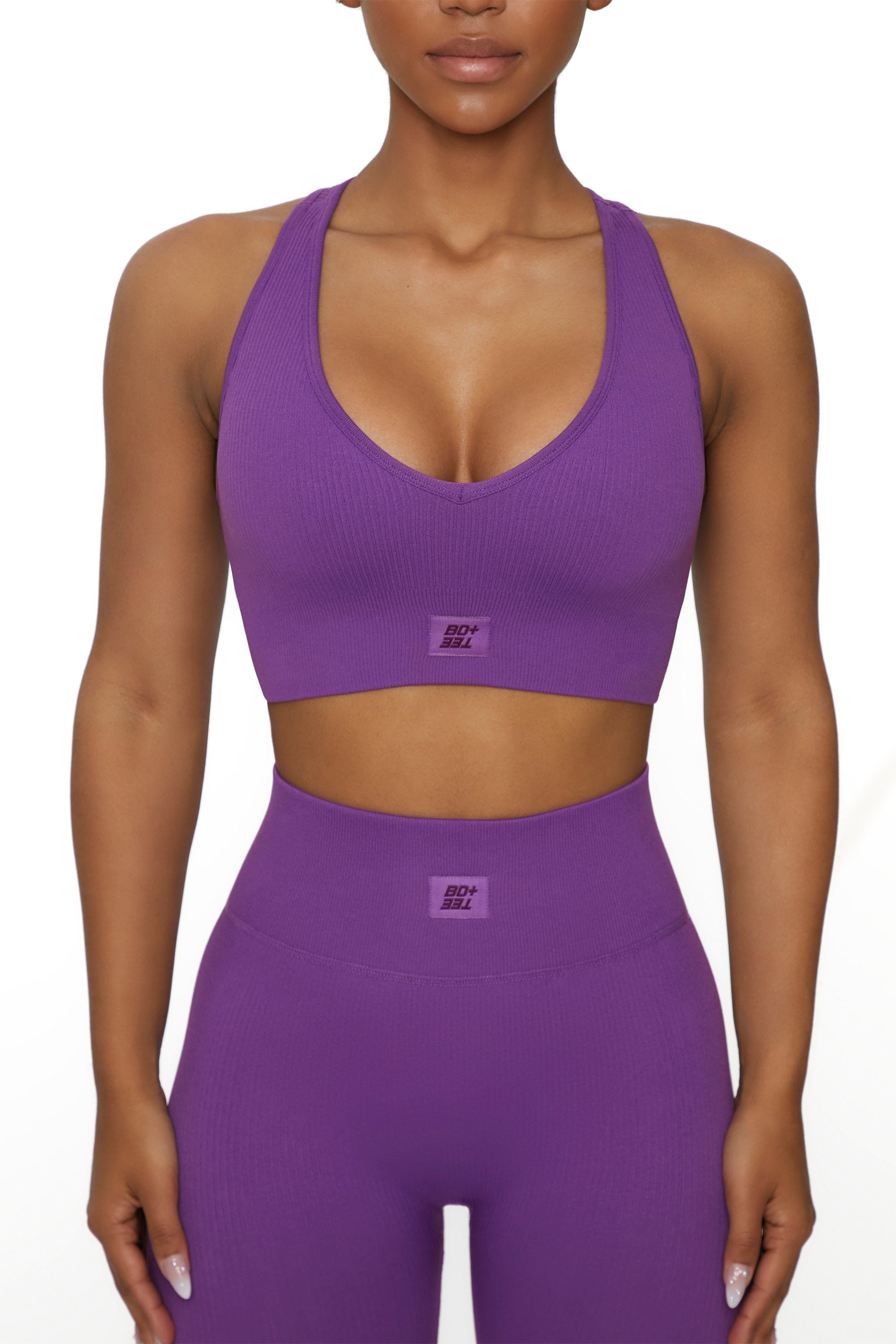 http://boandtee.com/cdn/shop/products/BT0135_1_Be-The-Best-Purple-V-Neck-Sports-Bra_1.jpg?v=1650396452