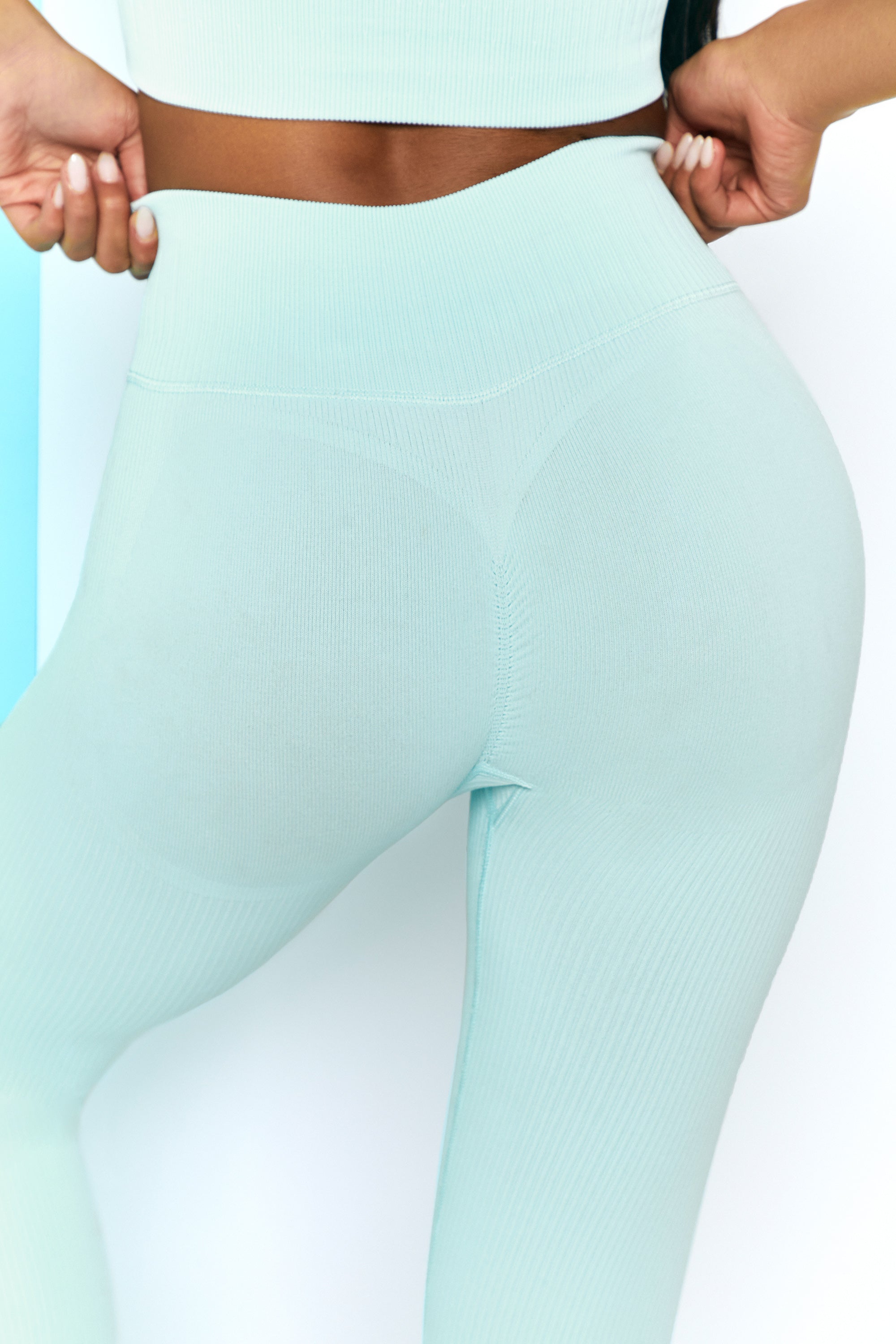 Royal to light blue ombre exercise capri length leggings. Made of 65%  nylon, 30% polyester and 5% Spandex. Sold in packs of six - two smalls, two  mediums, two larges., 732479