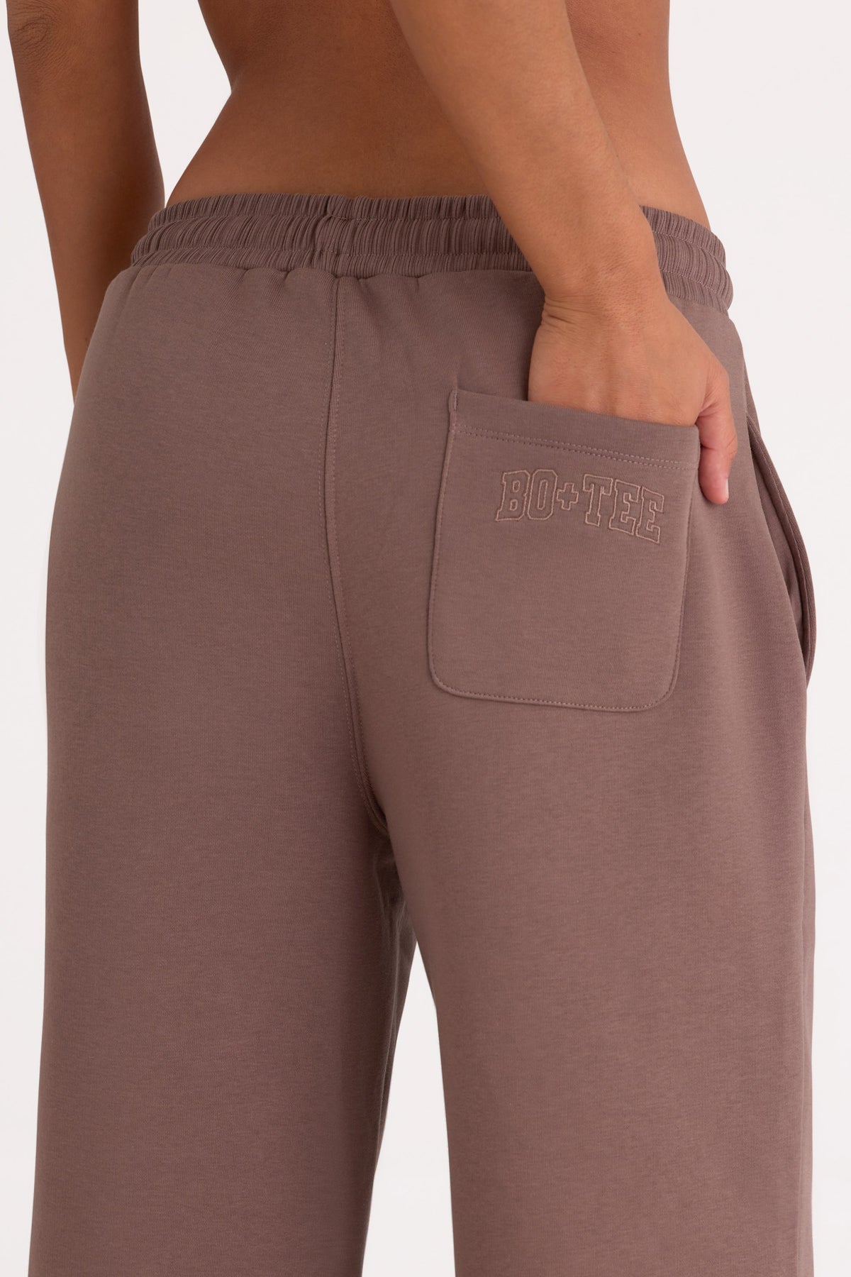 Bo+Tee model Lydia Butler wearing the CosyCoffeeRunWithLydsButler Joggers in Cocoa Brushback sweat fabric perfect for casual walks