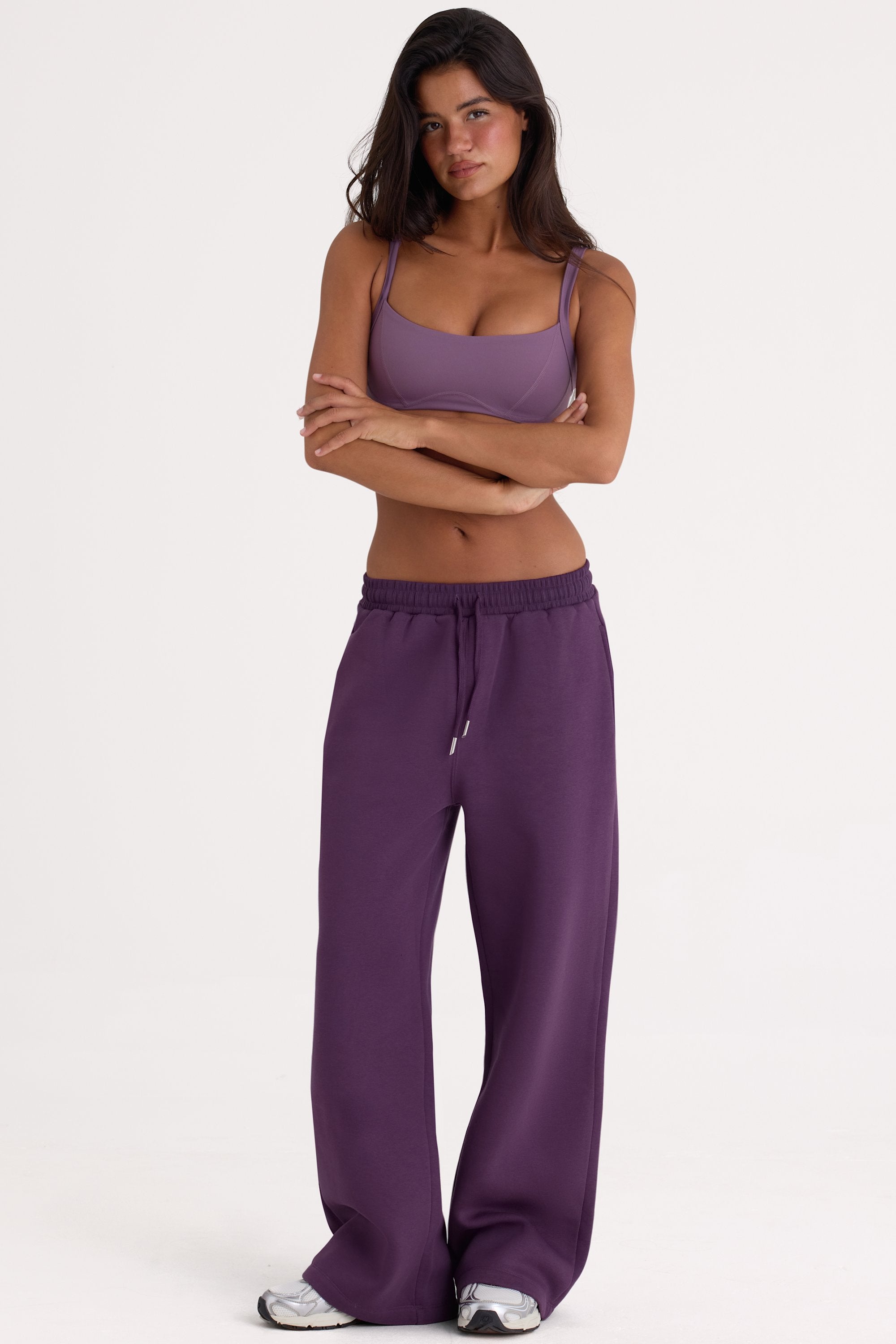 Bo+Tee model Lydia Butler wearing the CosyCoffeeRunWithLydsButler Joggers in Plum Brushback sweat fabric perfect for morning coffee runs