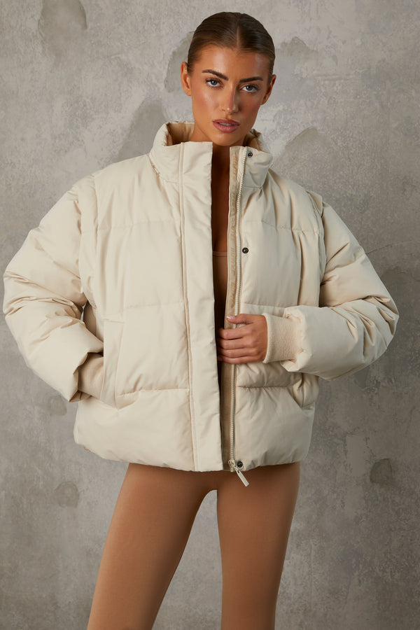Essential - Cropped Puffer Jacket with Detachable Sleeves in Sand