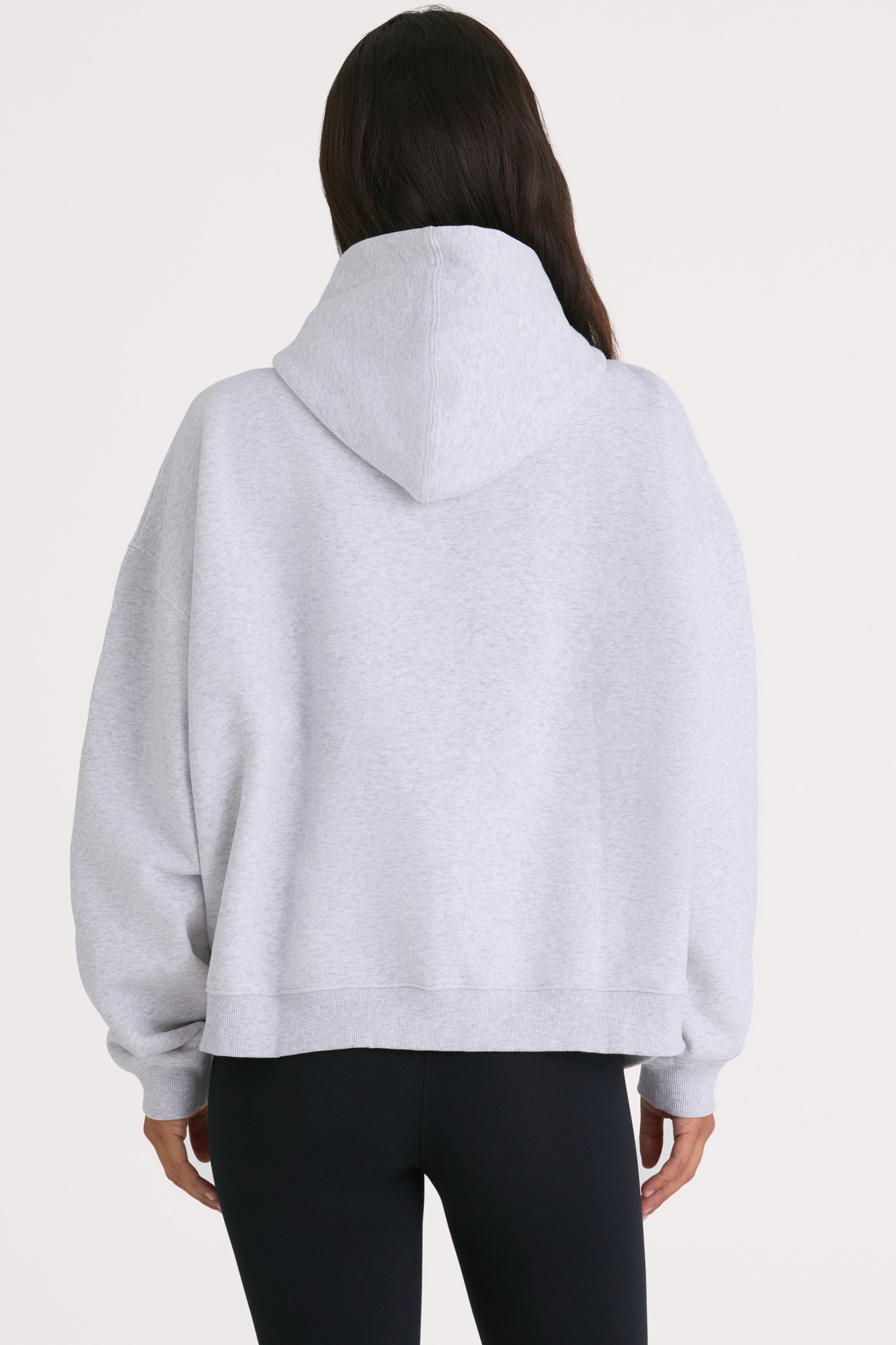 Bo+Tee model Kiele wearing the Varsity Hoodie in Marl Grey Cotton fabric perfect for casual outings