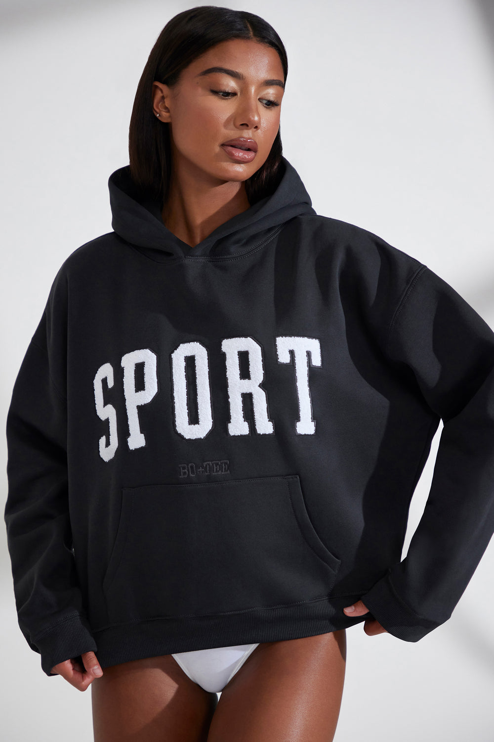 Varsity Oversized Hooded Sweatshirt in Black | Bo+Tee – Bo&Tee