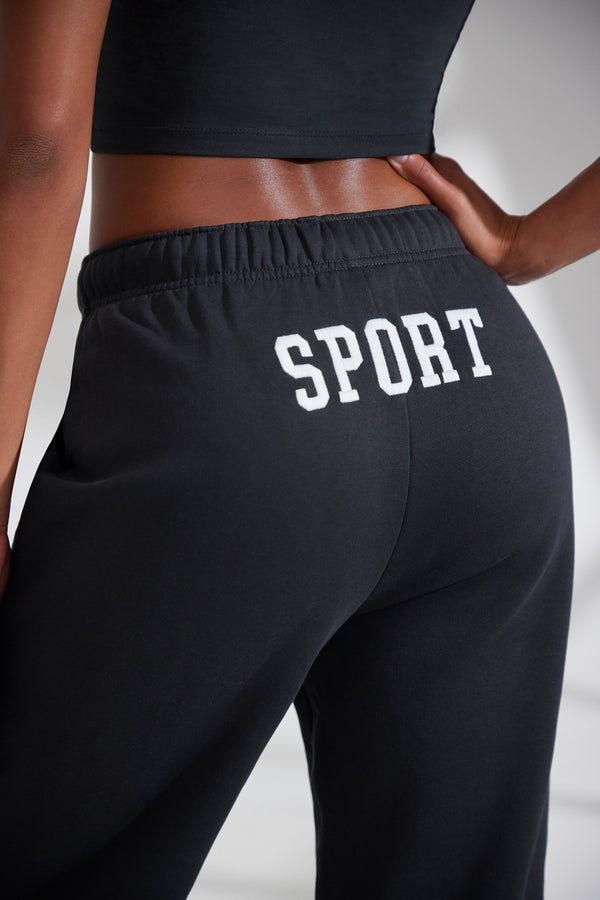 Athletics - Petite Wide Leg Embroidered Back Joggers in Black