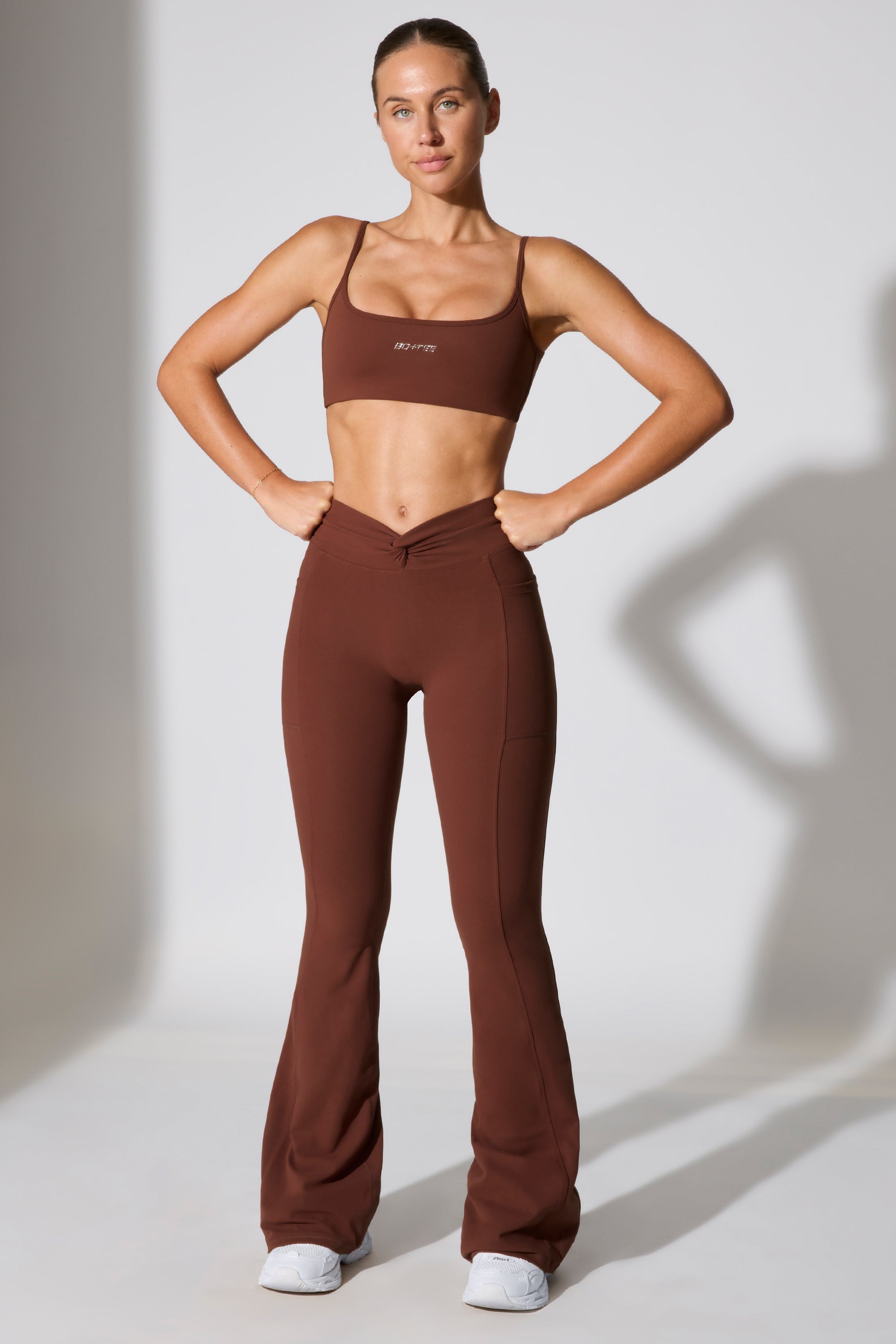 Realign - Twist Waist Flare Leggings in Chocolate