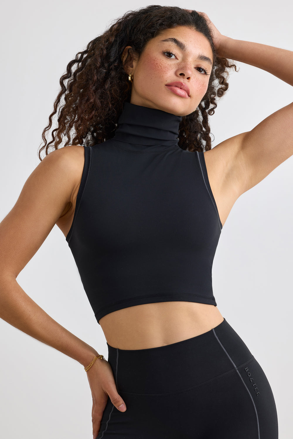 Immaculate Soft Active Turtleneck Tank Top in Black