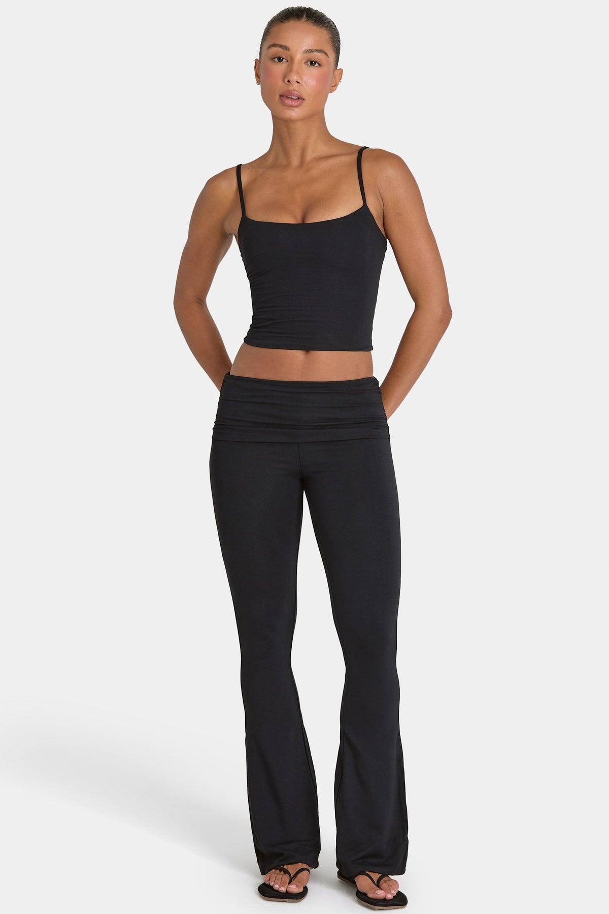 Bo+Tee model Hayley wearing the Rebloom Full Top in Black Modal fabric perfect for gym workouts