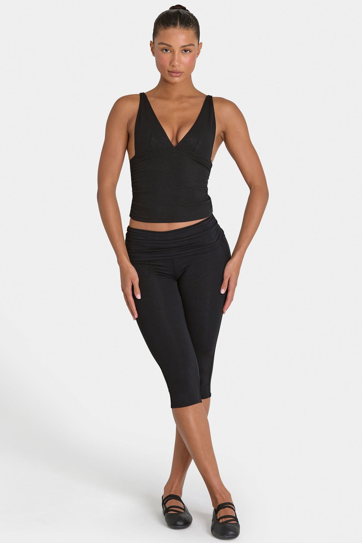 Bo+Tee model Kiele wearing the BT16360__Black Full Top in Black Ribbed Modal fabric perfect for gym workouts