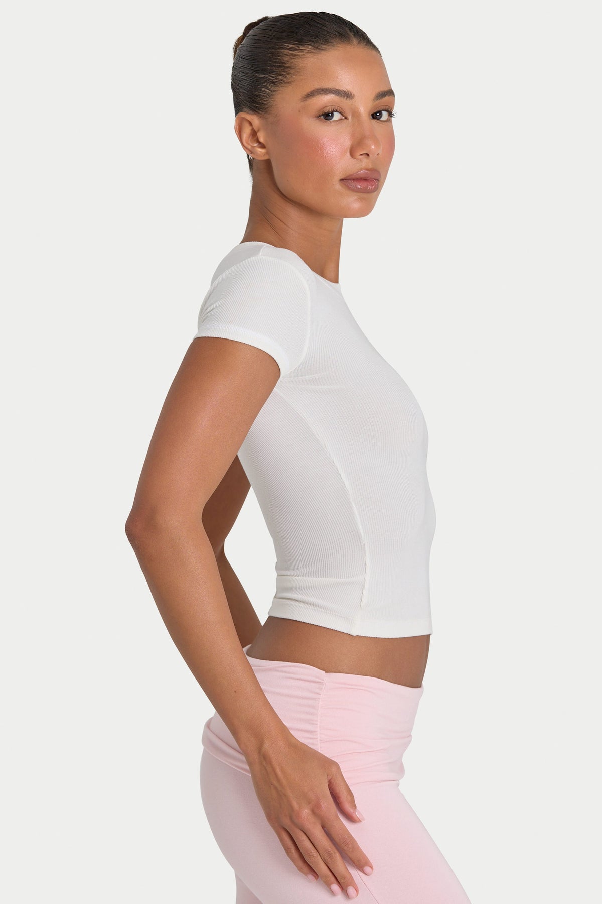 Bo+Tee model Kiele wearing the BT16367__Ivory T-Shirt in Ivory Ribbed Modal fabric perfect for summer city strolls