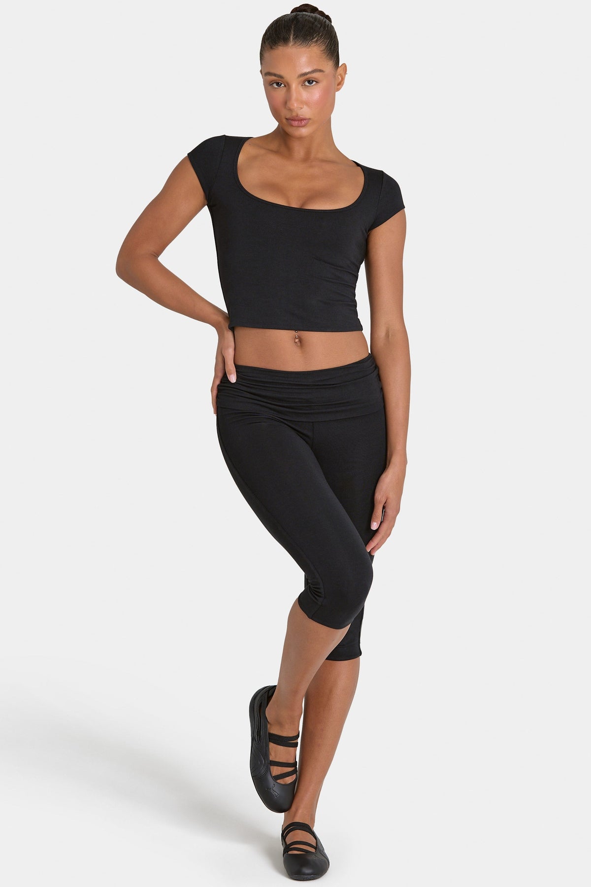 Bo+Tee model Kiele wearing the ButterCloud Full Top in Black Modal fabric perfect for yoga class