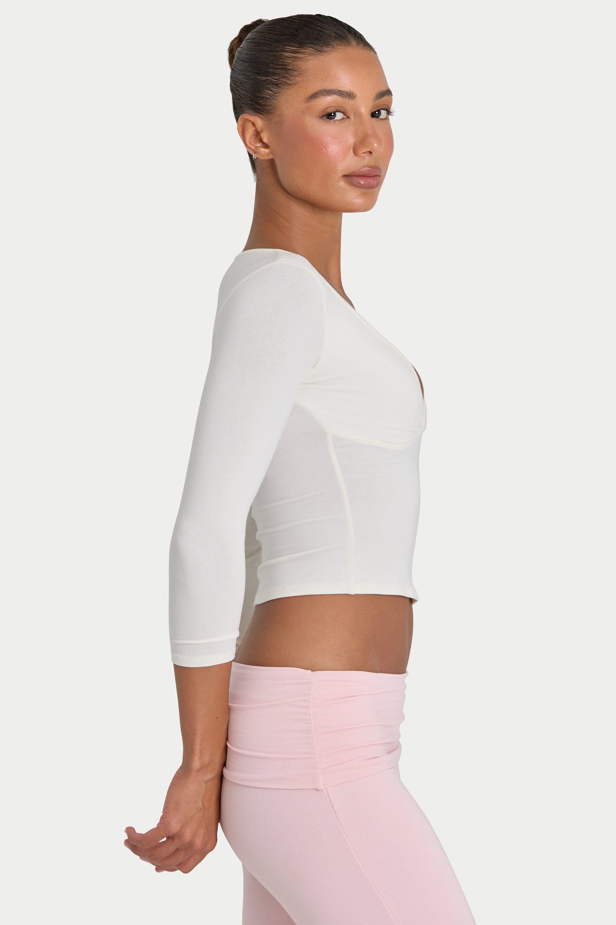 Bo+Tee model Kiele wearing the BT16395__IVO Full Top in Ivory Modal fabric perfect for running errands