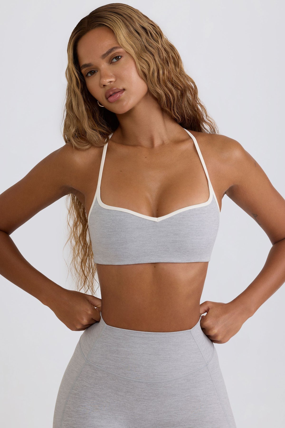 Bo+Tee model Hayley wearing the WithLovePerfectMatch Sports Bra in Grey Marl Soft Active (Cut & Sew) fabric perfect for gym workouts