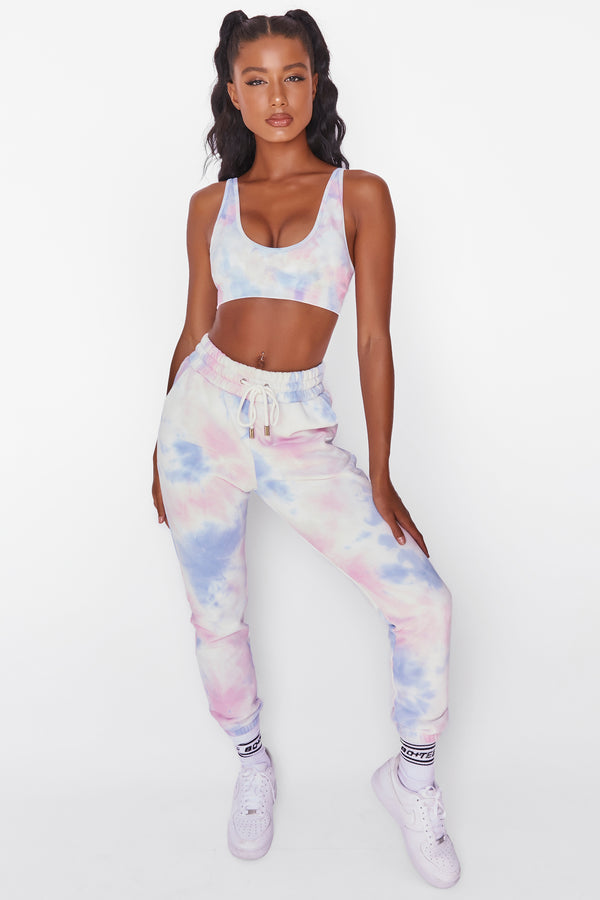 Tie dye full length cuffed joggers in a slim fit, with high waist and drawstring tie. Image 1 of 6