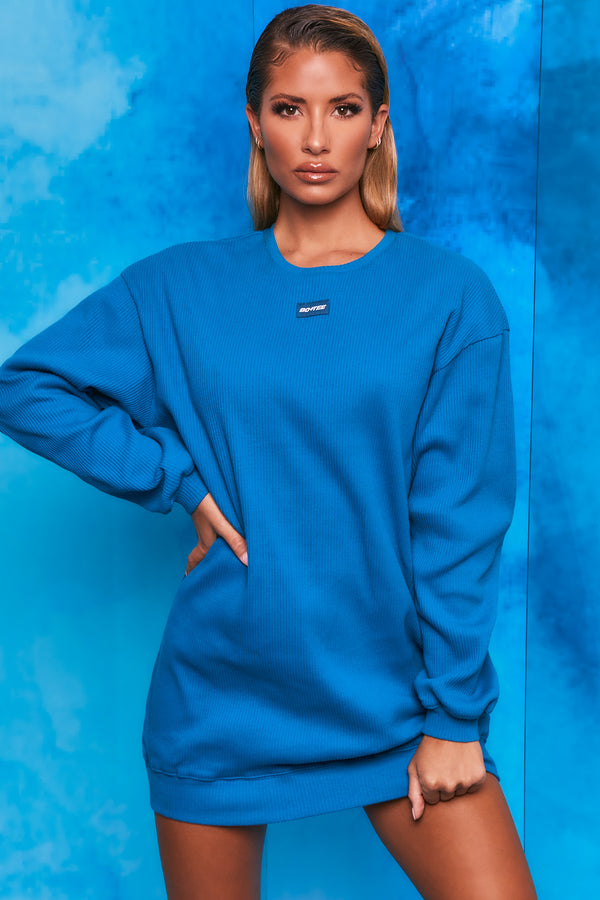 Plain blue ribbed oversized sweatshirt with long sleeves. Image 1 of 6.