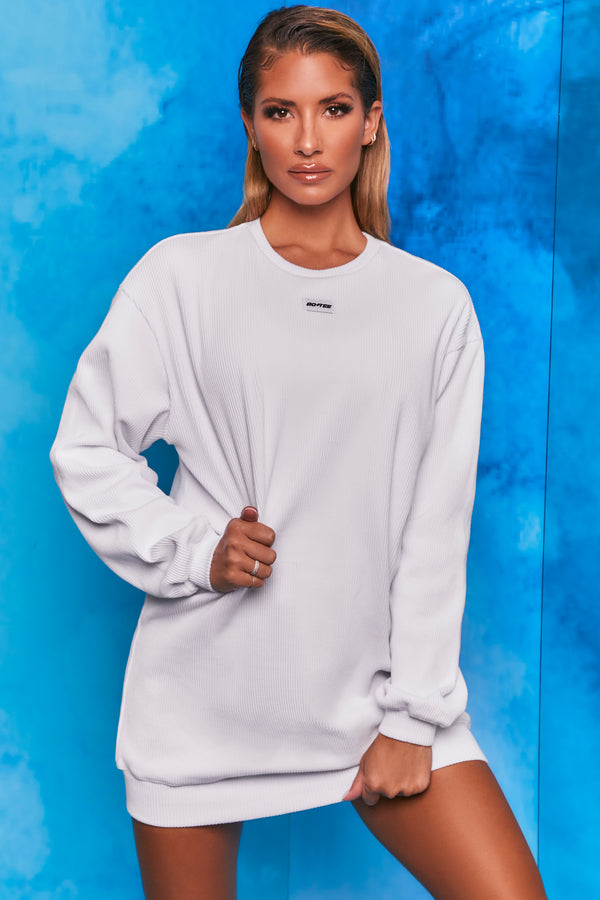 Plain white ribbed oversized sweatshirt with long sleeves. Image 1 of 6.
