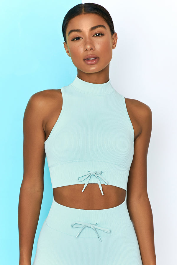https://boandtee.com/cdn/shop/products/BT0305_BT0301_1_Miles-Ahead-Move-It-Light-Blue-Ribbed-Work-Out-Crop-Top-High-Waist-Draw-String-Ribbed-Cycle-Shorts-Top.jpg?v=1624629268&width=600