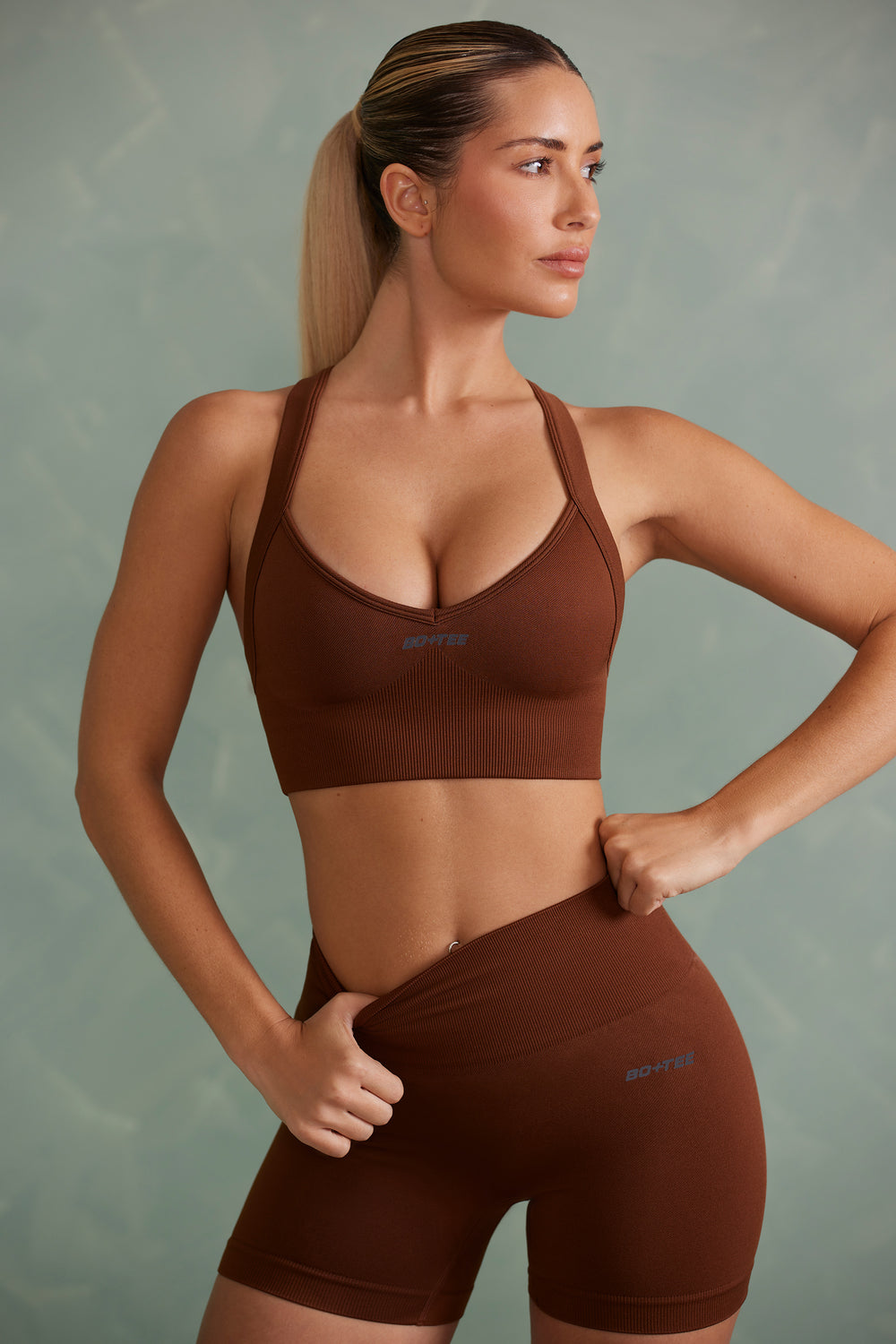 Hoxton Haus cut out sports bra in chocolate brown - ShopStyle
