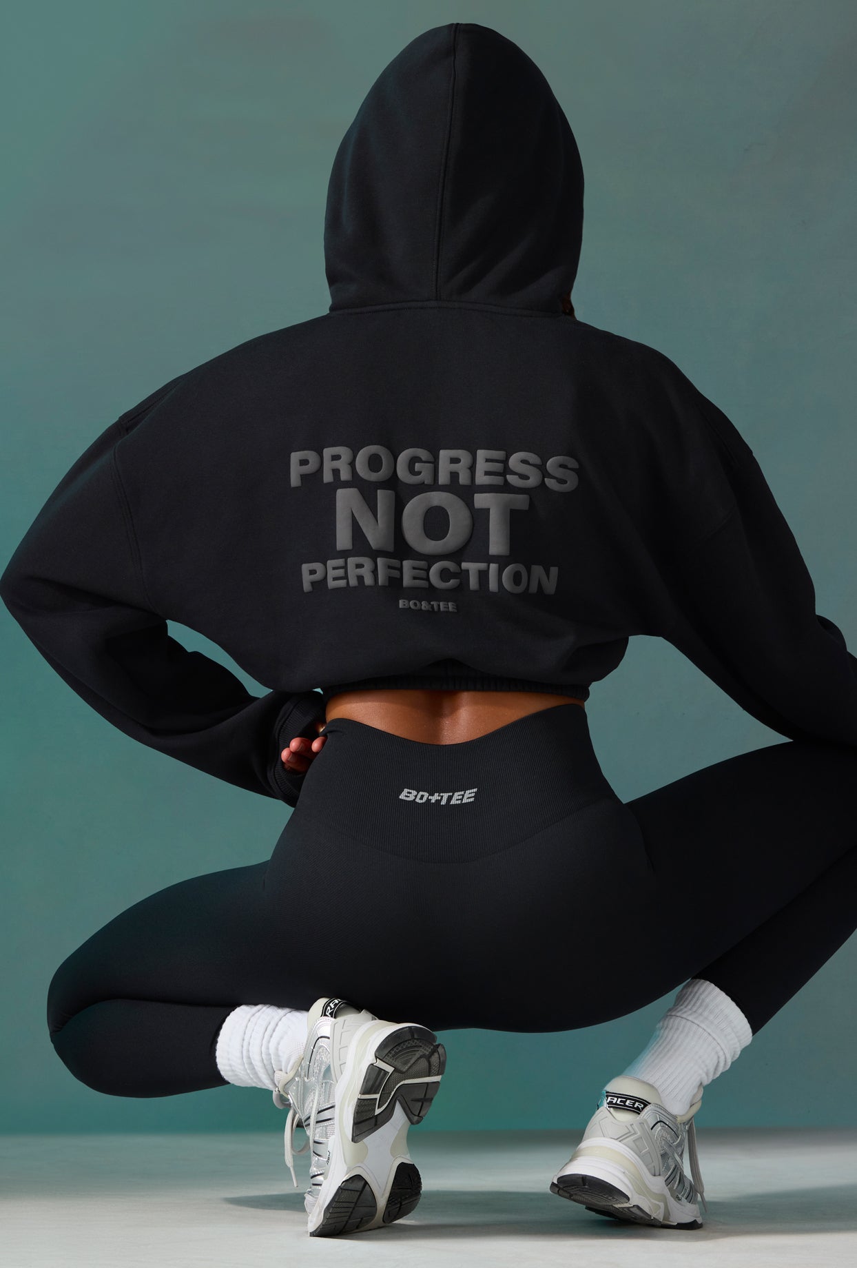 Progress - Cropped Drawstring Hooded Sweatshirt in Black